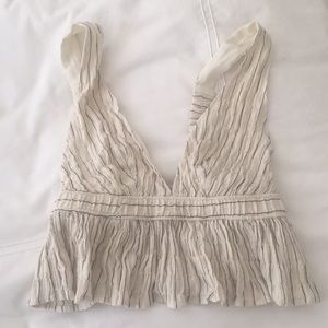 Never worn size XS Feminine top